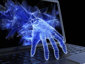 Hand stealing data through a computer screen