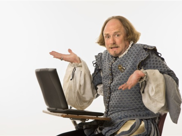 Shakespeare confused behind laptop