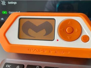 Flipper Zero device with Malwarebytes logo on the display