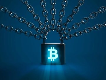 The Week in Ransomware – March 8th 2024 Lock with a bitcoin symbol in chains