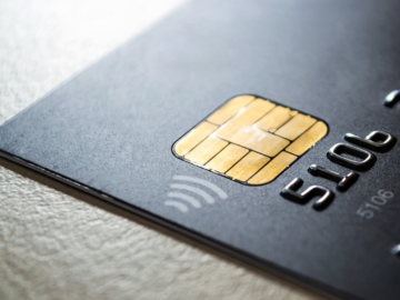 Payment provider data breach exposes credit card information of 1.7 million customers Close up of black credit card.