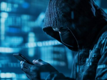 Police seize Matrix encrypted chat service after spying on criminals Criminal holding a phone