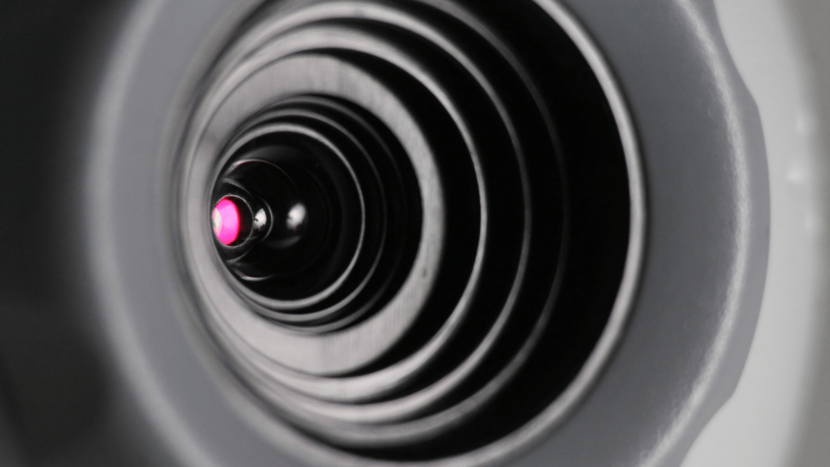 Man accused of using keylogger to spy on colleagues, log in to their personal accounts and watch them at home Close up of webcam